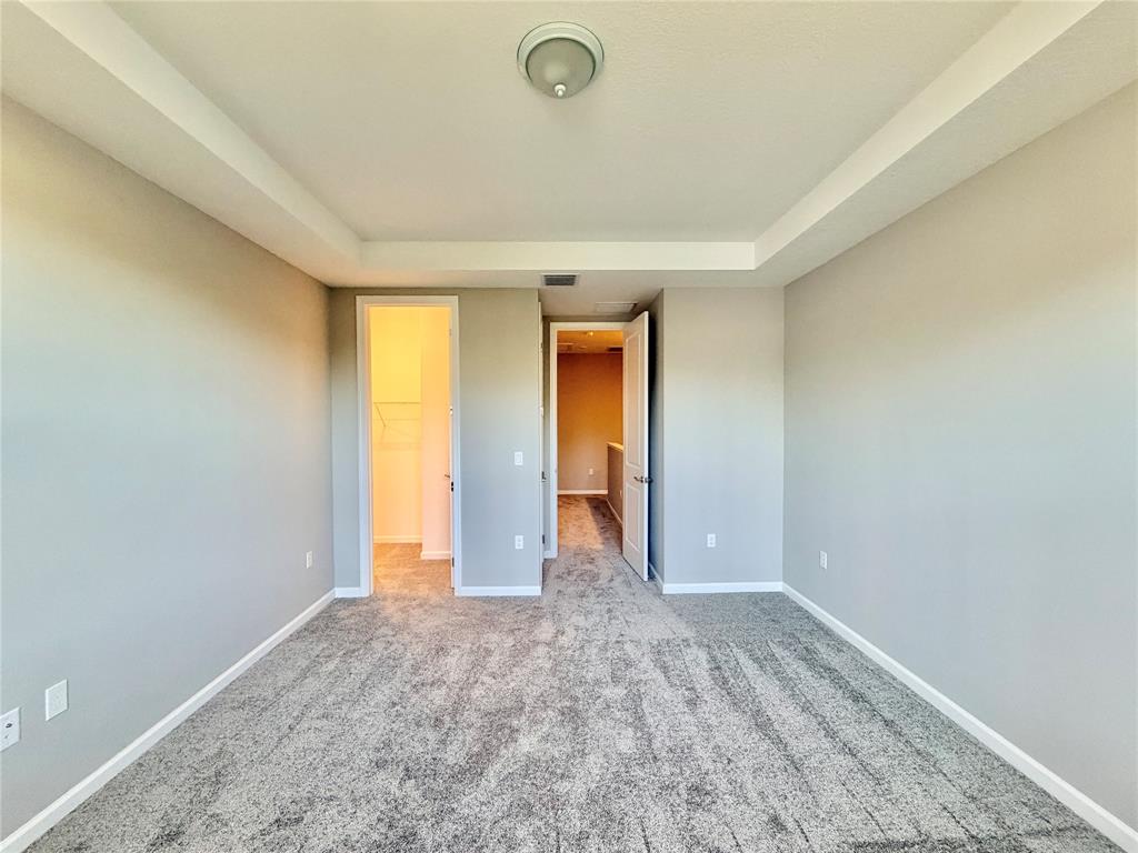 288 Southwest Sally Way Stuart, FL 34997 - Photo 20 of 22 an empty room with closet and wooden floor