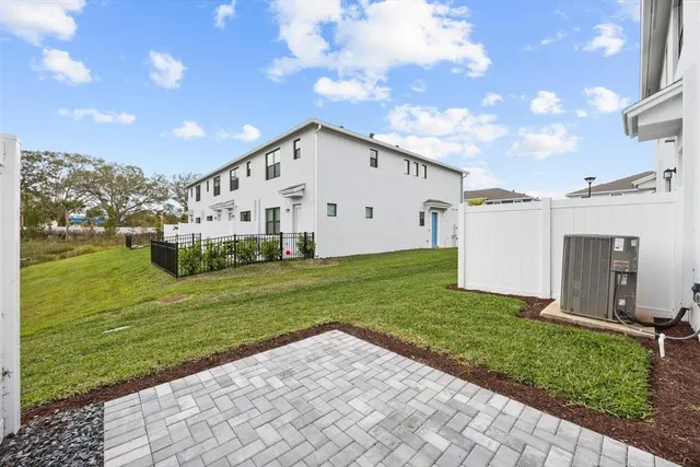 a view of a garden with an outdoor space