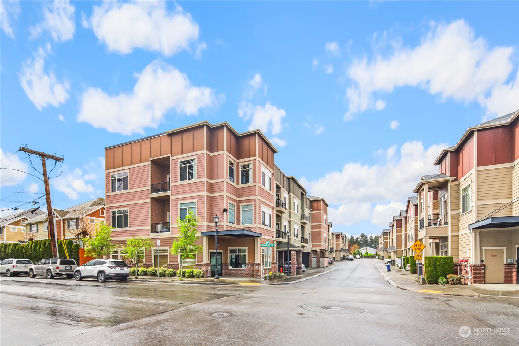 4005 Northeast 3rd Place, Unit 3E Renton, WA 98056 - Photo 26 of 28 a view of a building with a street