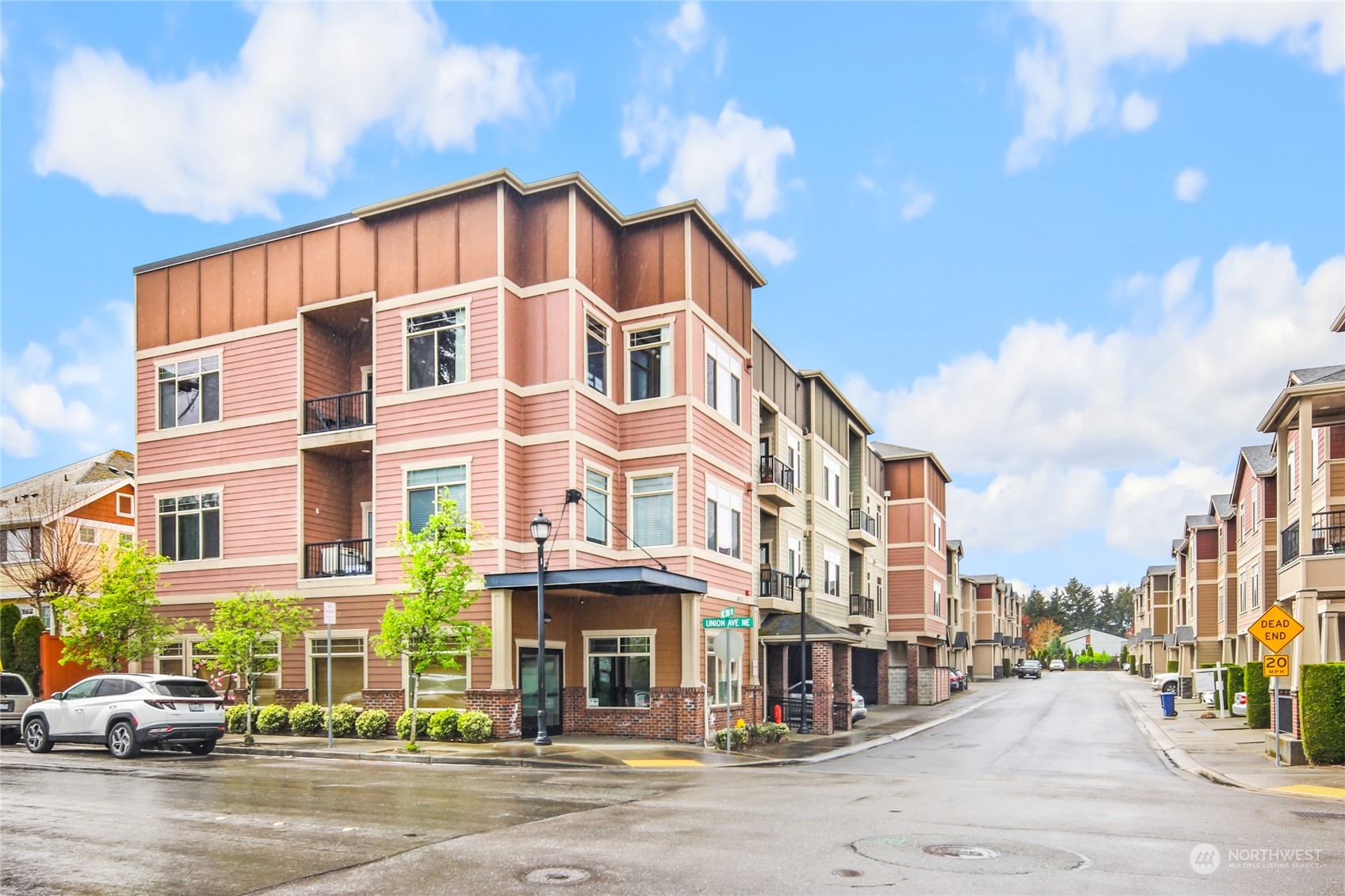 4005 Northeast 3rd Place, Unit 3E Renton, WA 98056 - Photo 27 of 28 a view of a building along a street