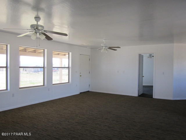665 West Ahonen Road Paulden, AZ 86334 - Photo 4 of 18 a view of an empty room with a window