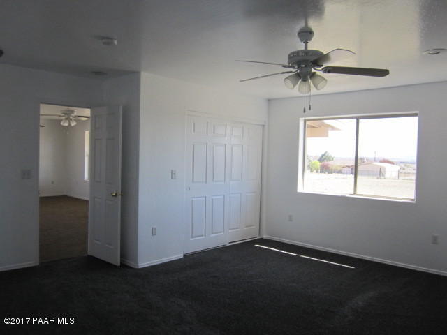 665 West Ahonen Road Paulden, AZ 86334 - Photo 8 of 18 a view of an empty room with a window
