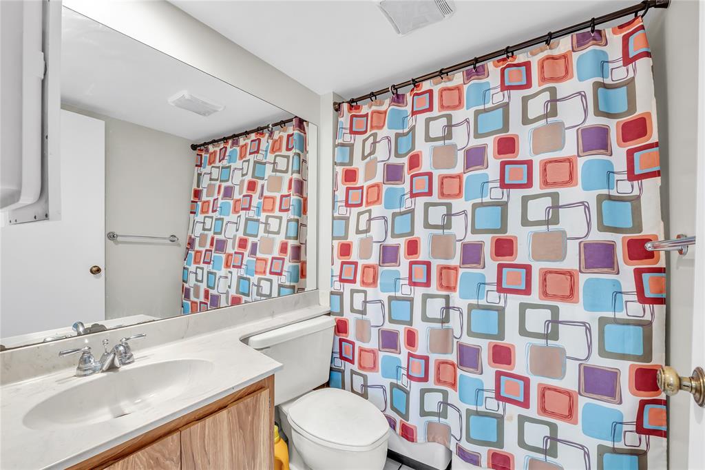 9104 Southwest 19th Place, Unit A Davie, FL 33324 - Photo 12 of 31 a bathroom with a sink toilet and shower