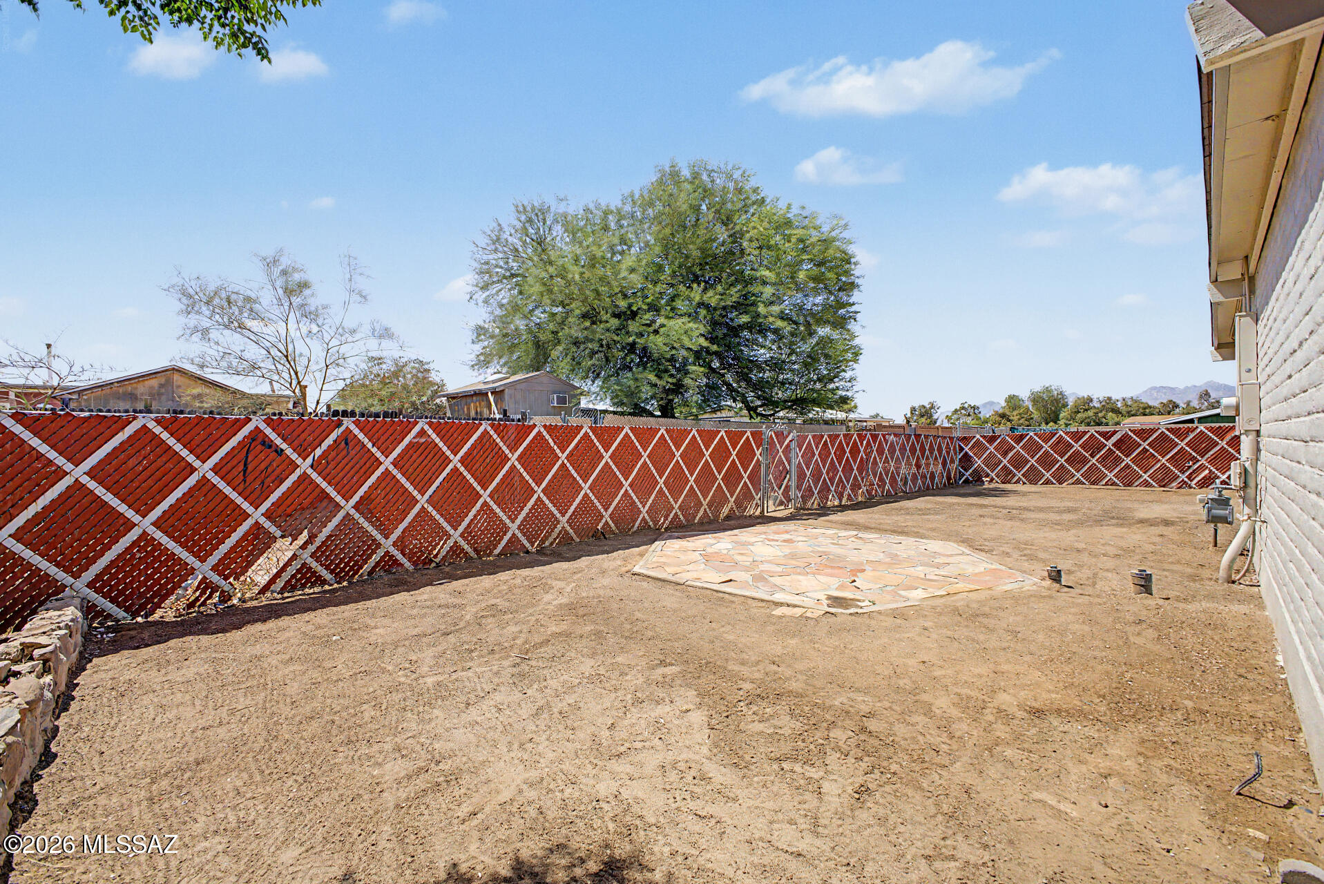 3402 South Kolb Road Tucson, AZ 85730 - Photo 28 of 32 a view of outdoor space with wooden fence