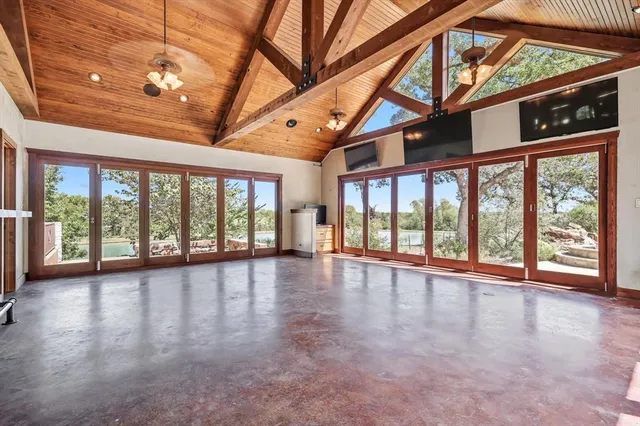 a kitchen with stainless steel appliances granite countertop a stove and a sink