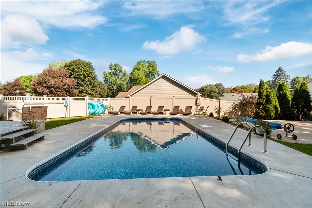 928 Bridge Road Akron, OH 44312 - Photo 32 of 35 14 x 28 pool. 4' deep. Upgraded heavy liner. Full steps. Complete pool area backfilled with 35 tons of gravel. No dirt used. Extra / spare plumbing ran to each location. Over sized heater can heat 2-3 degrees per hour. Vinyl fence. All added / installed in 2019.