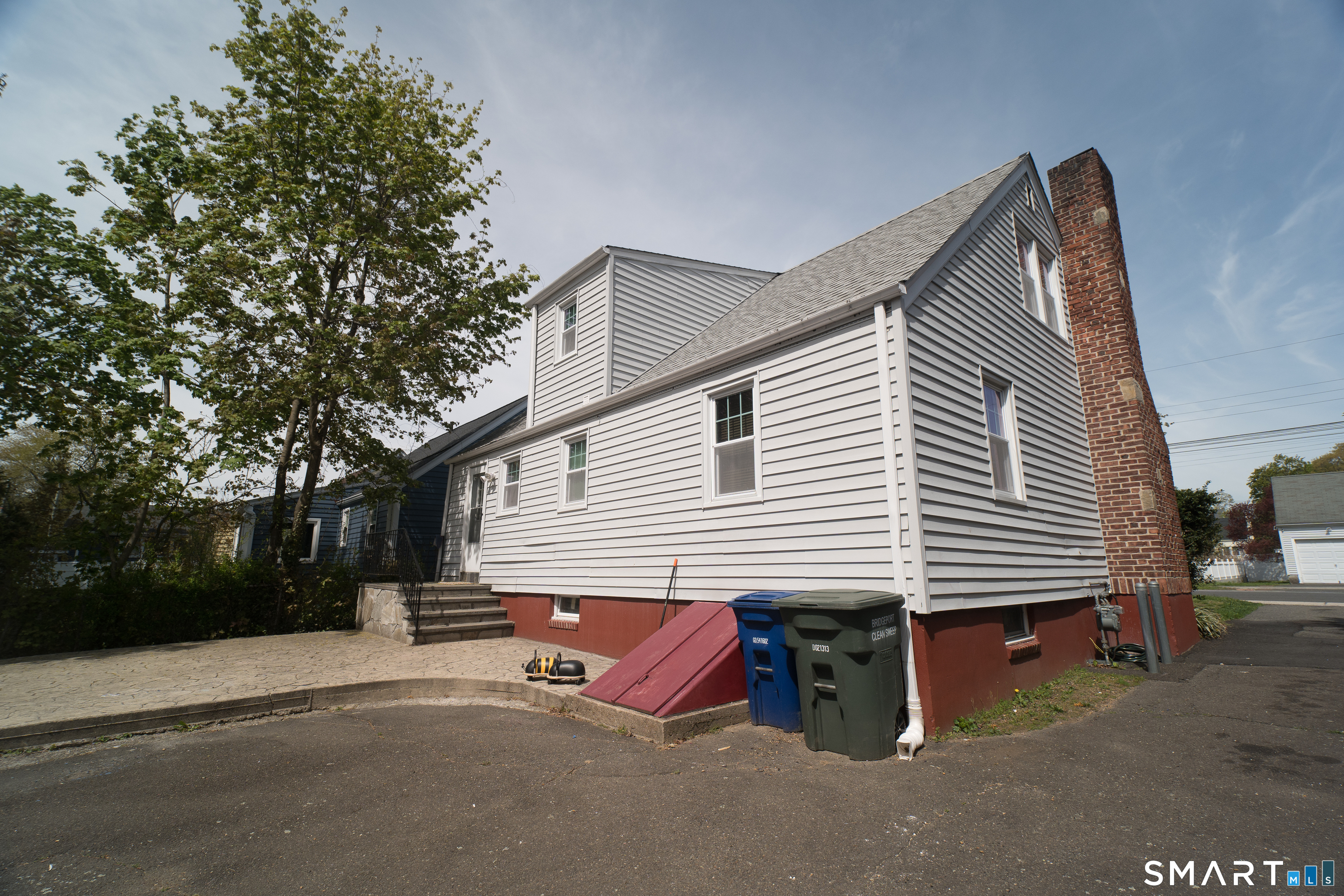 113 Clark Street Bridgeport, CT 06606 - Photo 24 of 27 a view of a house with a yard