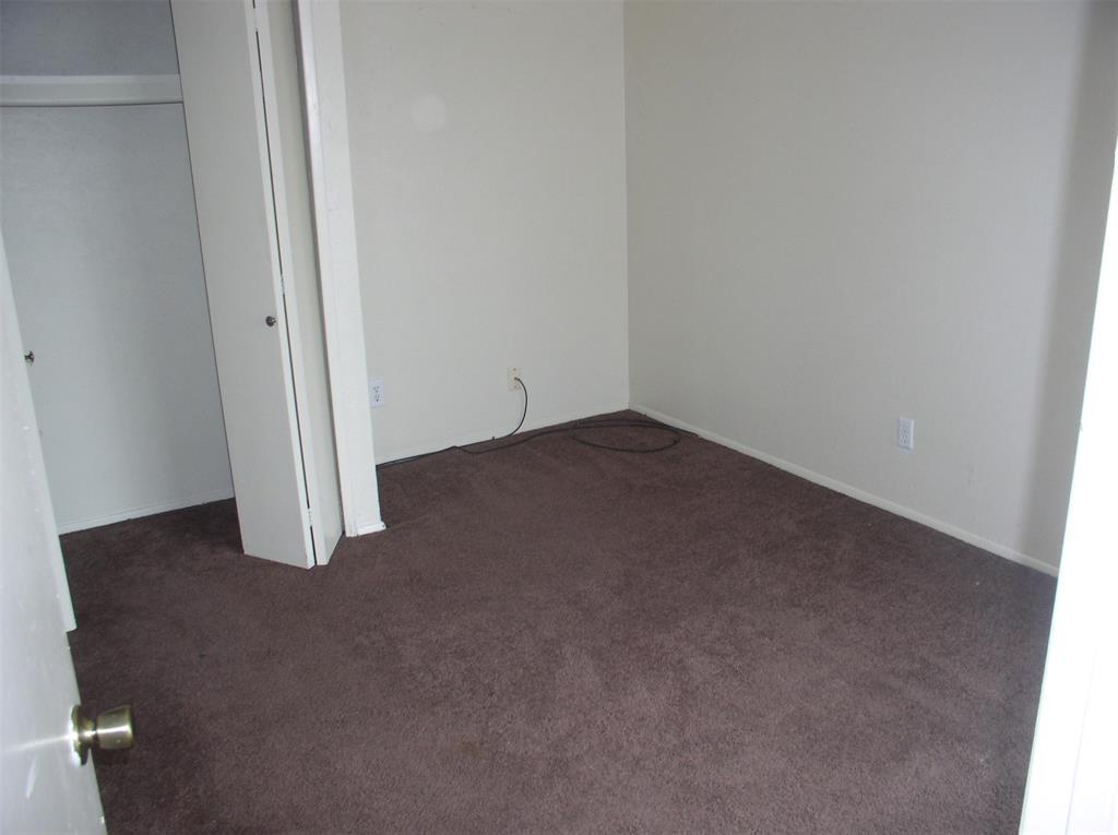 7210 Pineberry Road Dallas, TX 75249 - Photo 8 of 10 Bedroom 2