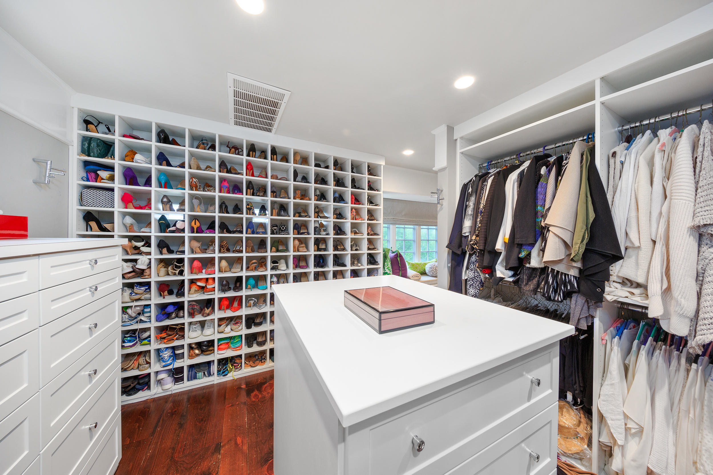 10 Juniper Road Rowayton, CT 06853 - Photo 14 of 28 a view of walk in closet with clothes and shoes