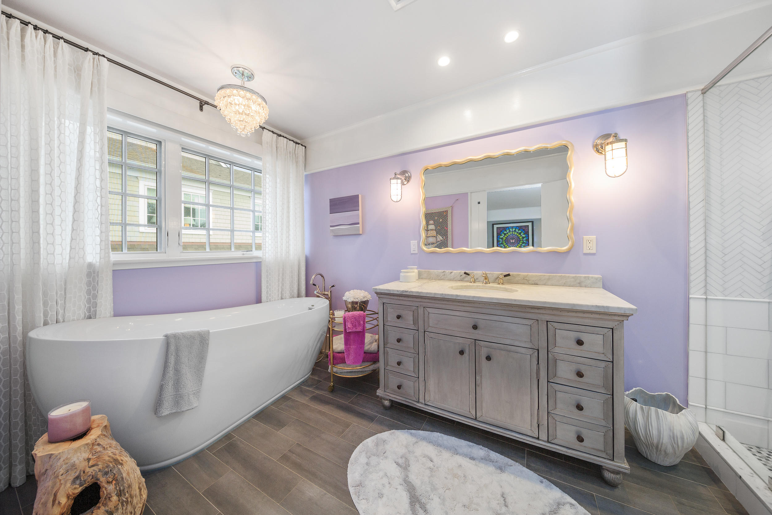 10 Juniper Road Rowayton, CT 06853 - Photo 15 of 28 a bathroom with a sink mirror and a bath tub