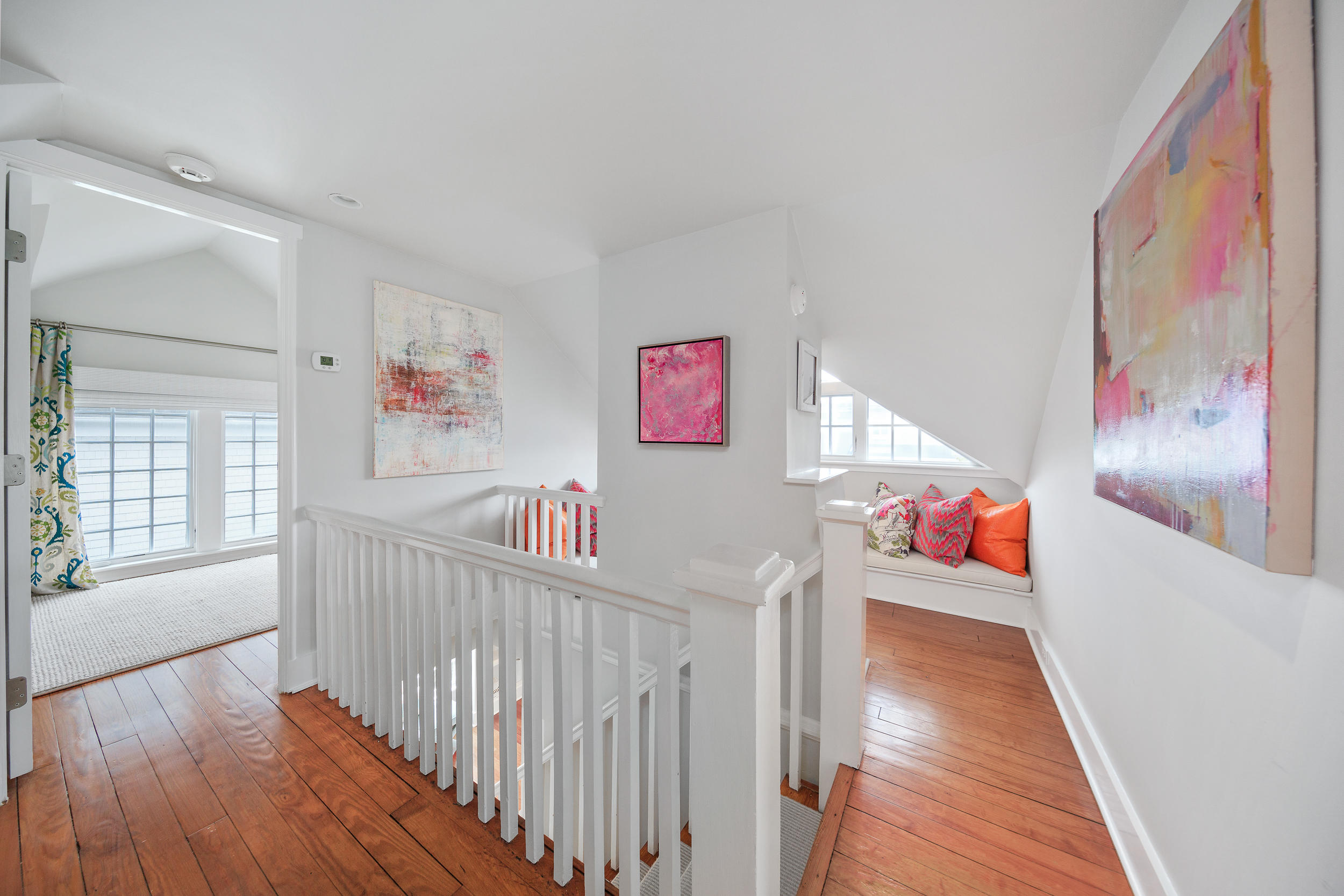 10 Juniper Road Rowayton, CT 06853 - Photo 16 of 28 a view of a hallway with wooden floor and windows
