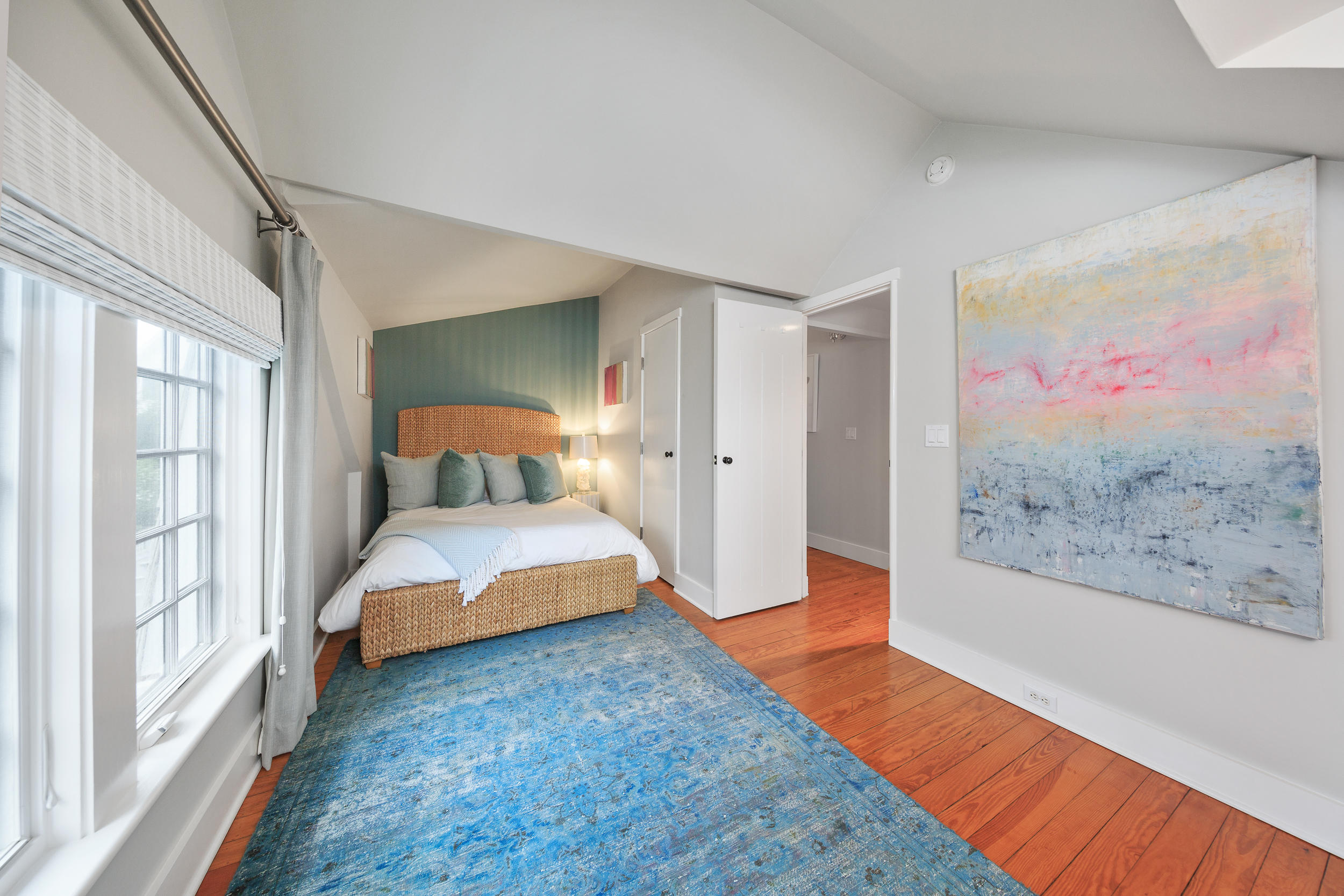 10 Juniper Road Rowayton, CT 06853 - Photo 19 of 28 a bedroom with a bed and window