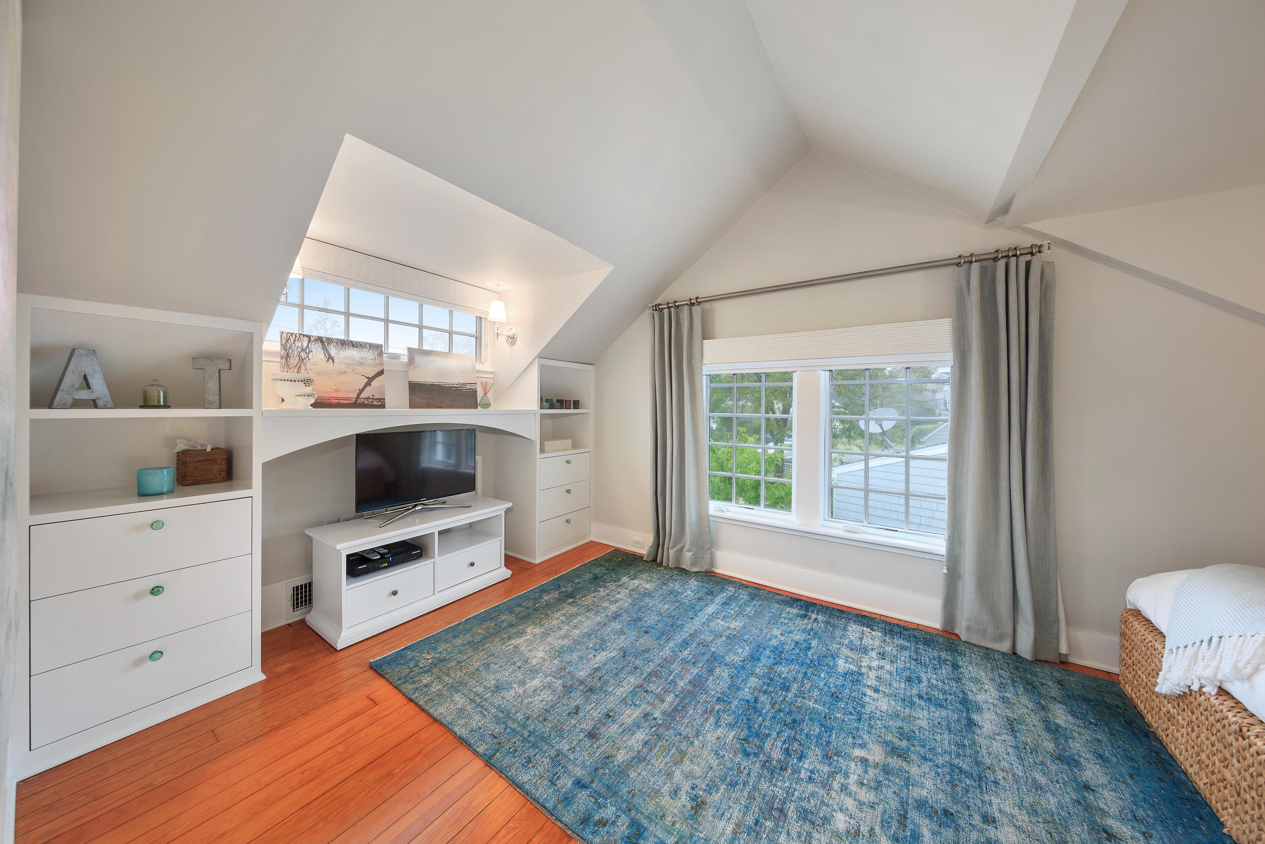 10 Juniper Road Rowayton, CT 06853 - Photo 21 of 28 a living room with furniture and a flat screen tv