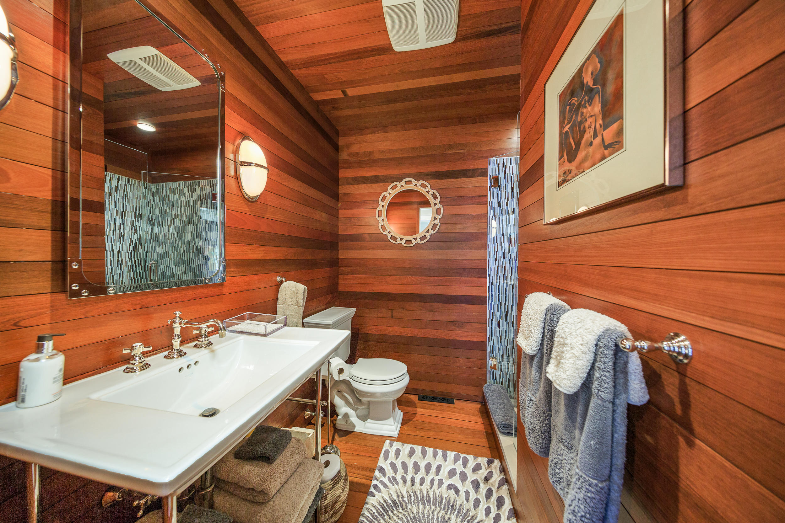 10 Juniper Road Rowayton, CT 06853 - Photo 22 of 28 a bathroom with a sink and a mirror