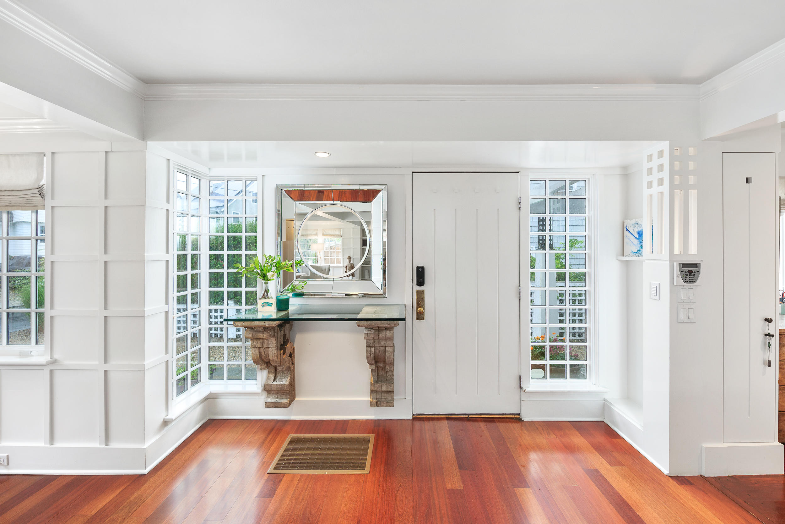 10 Juniper Road Rowayton, CT 06853 - Photo 5 of 28 a living room with stainless steel appliances a wooden floor and a window