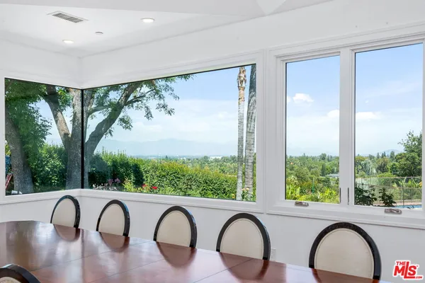 a view of a porch and a yard