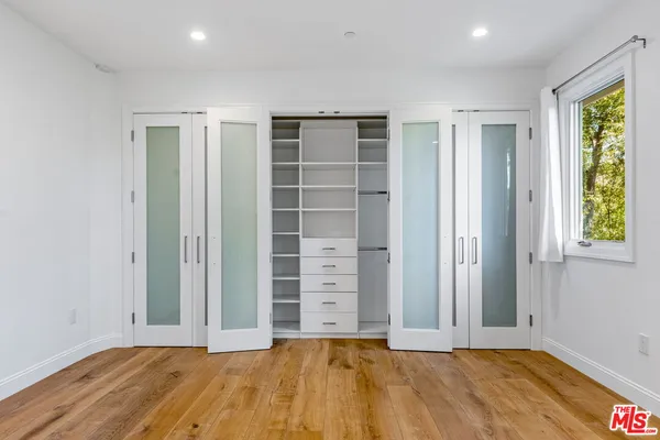 a view of a house with a yard porch and sitting area