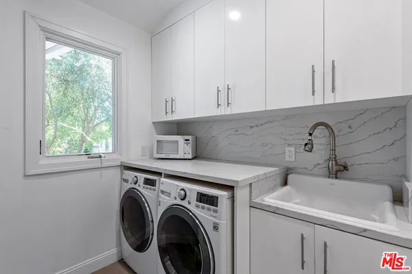 a view of a house with a back yard