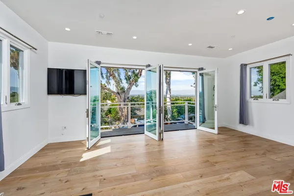 a view of a swimming pool with a garden