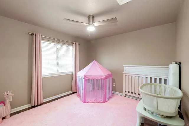 a view of livingroom with furniture and window