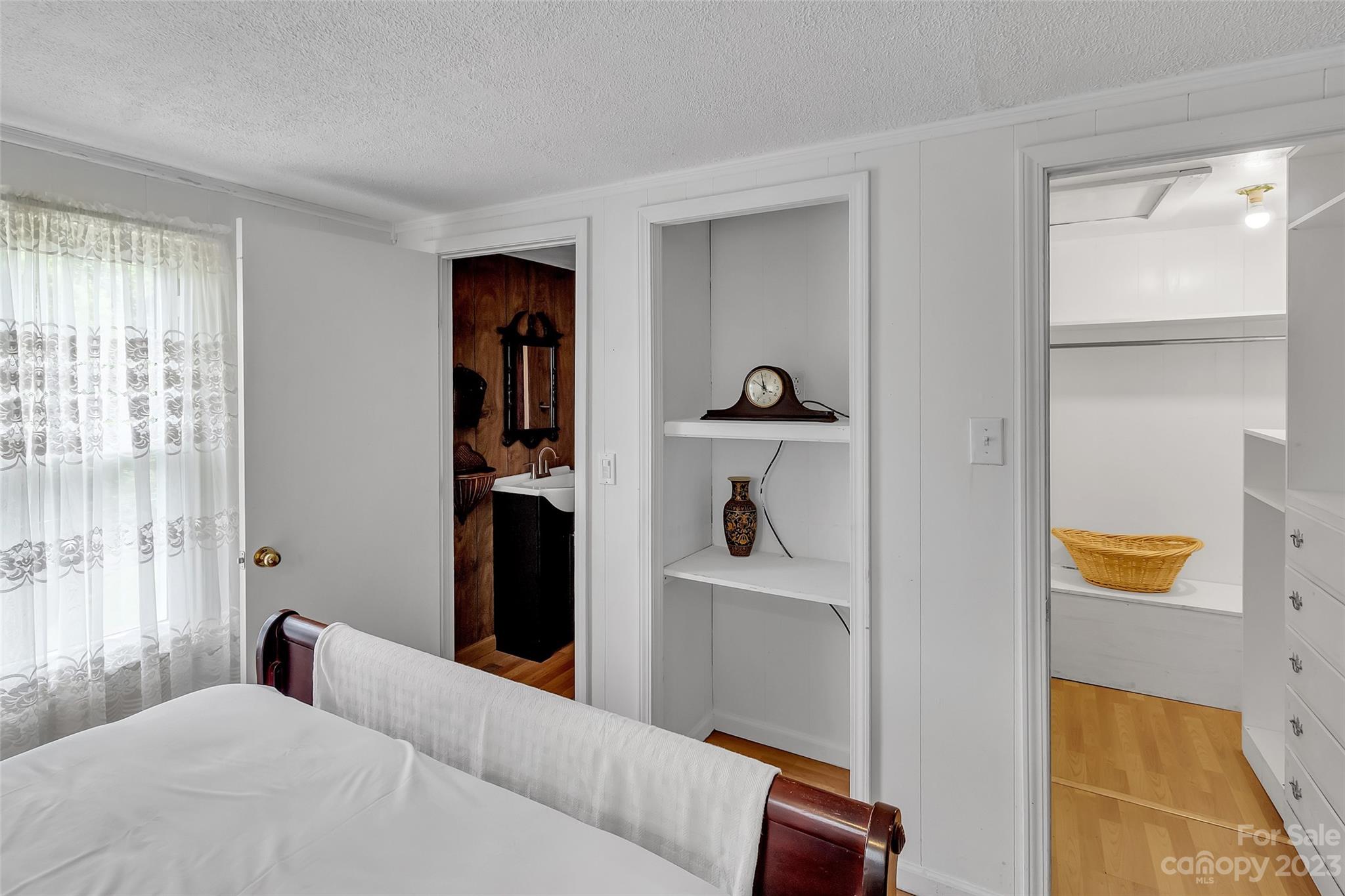 9 Alzena Road Sylva, NC 28779 - Photo 12 of 25 a bedroom with a bed and a window