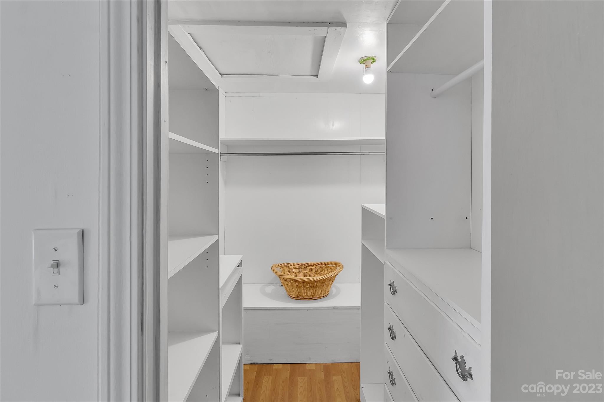 9 Alzena Road Sylva, NC 28779 - Photo 13 of 25 a view of walk in closet with empty racks