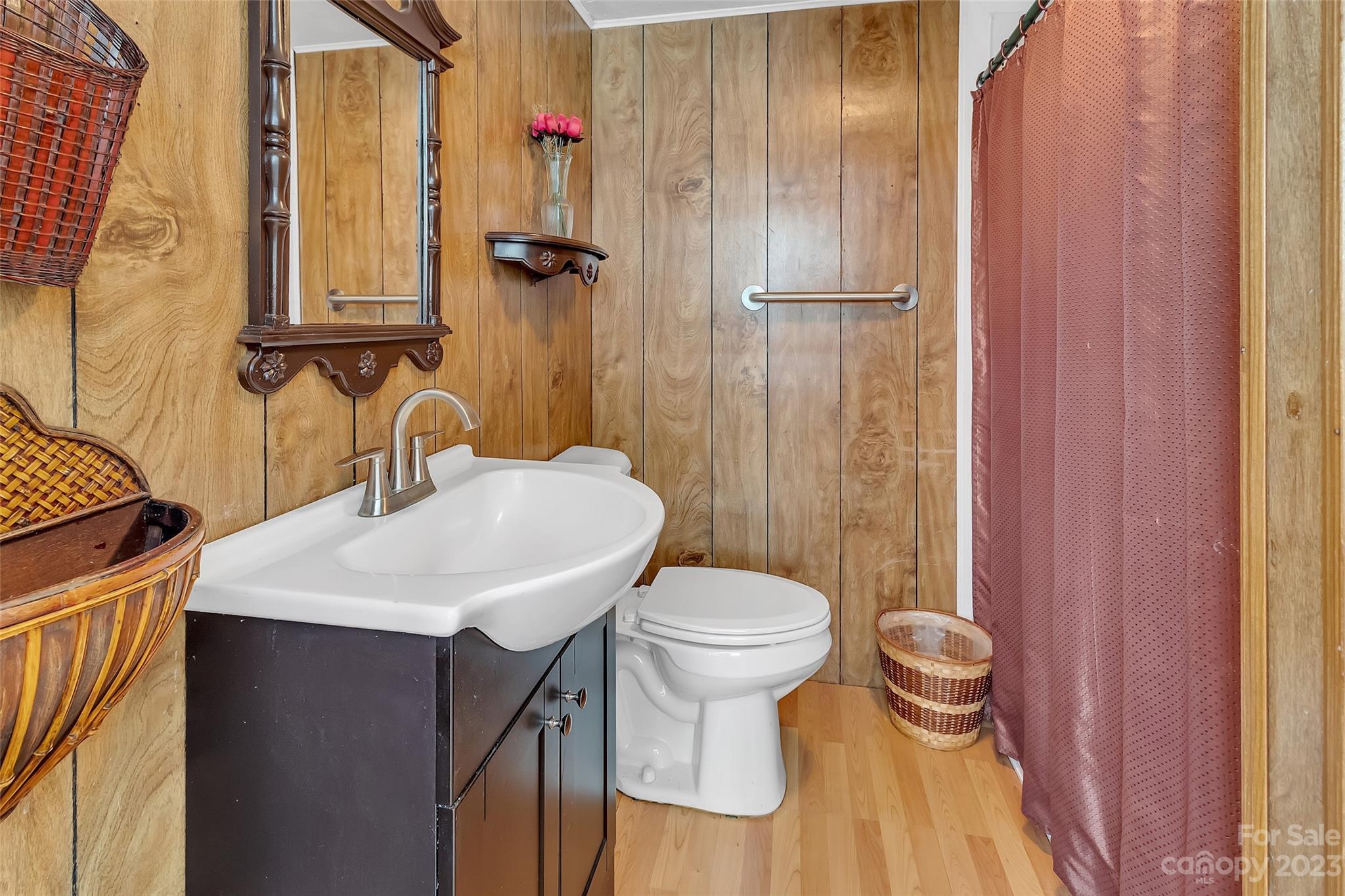 9 Alzena Road Sylva, NC 28779 - Photo 14 of 25 a bathroom with a sink toilet and shower