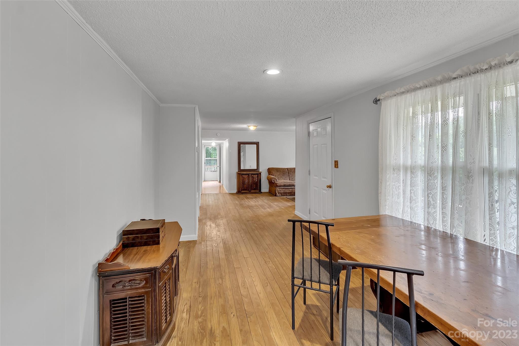 9 Alzena Road Sylva, NC 28779 - Photo 7 of 25 a view of kitchen with furniture and wooden floor