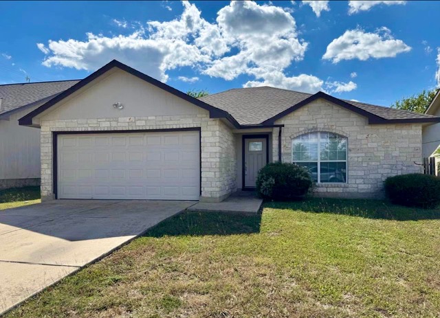 400 Blue Shale Drive Jarrell, TX 76537 - Photo 1 of 22 a view of a house with a yard