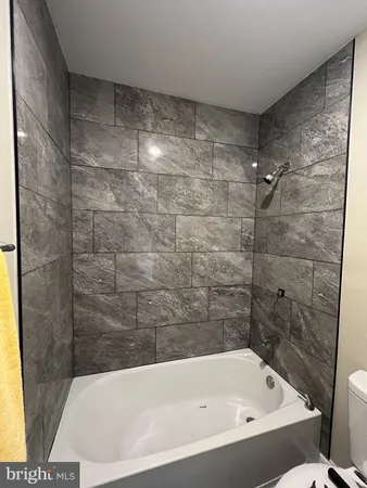 a bathroom with a bathtub