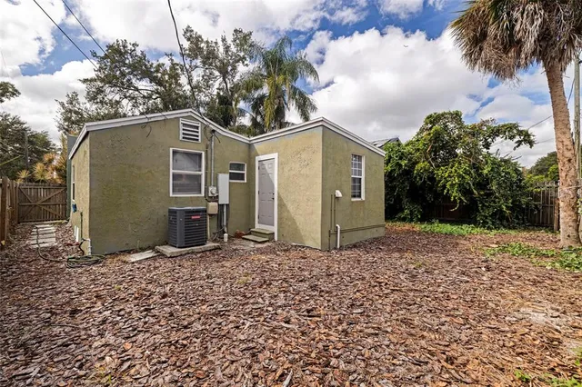 a backyard of a house with lots of green space