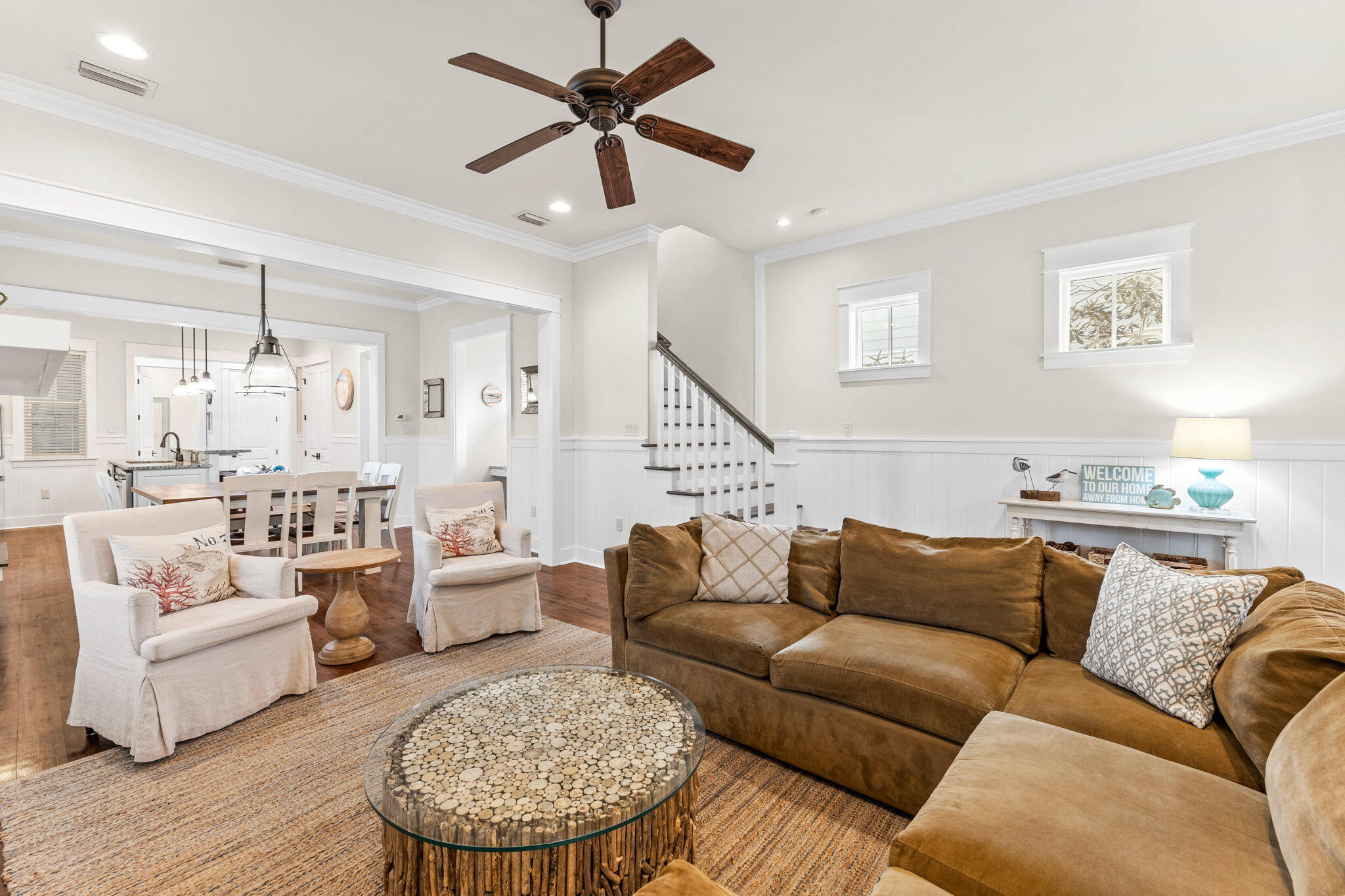 17 Red Basil Drive Santa Rosa Beach, FL 32459 - Photo 5 of 59 a living room with furniture kitchen view and a wooden floor