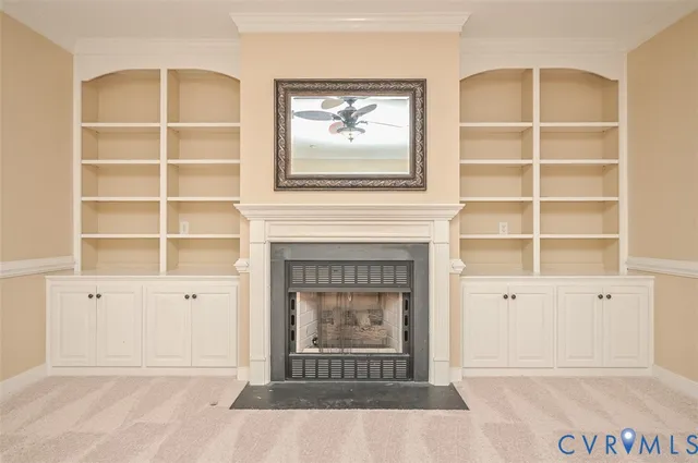 a living room with a fireplace