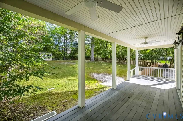 a view of a room with wooden floor and outdoor space