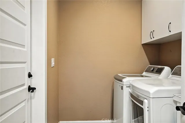 a view of a chairs and tables in the balcony