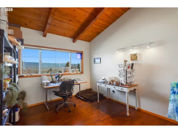 a view of a workspace with furniture
