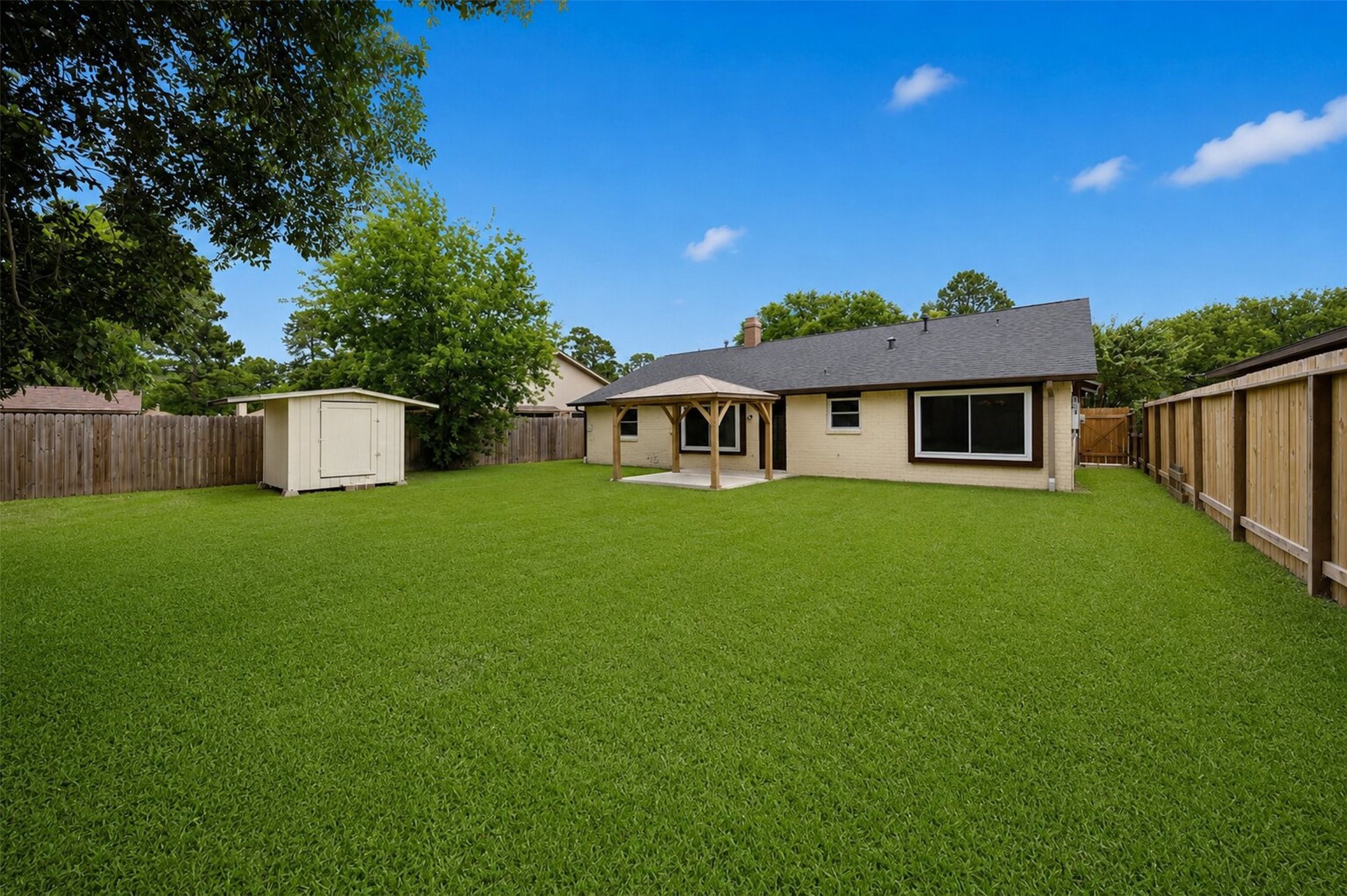 9418 Kilrenny Drive Spring, TX 77379 - Photo 44 of 47 a front view of a house with a yard and tree