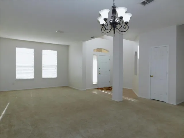 a view of a room with an entryway