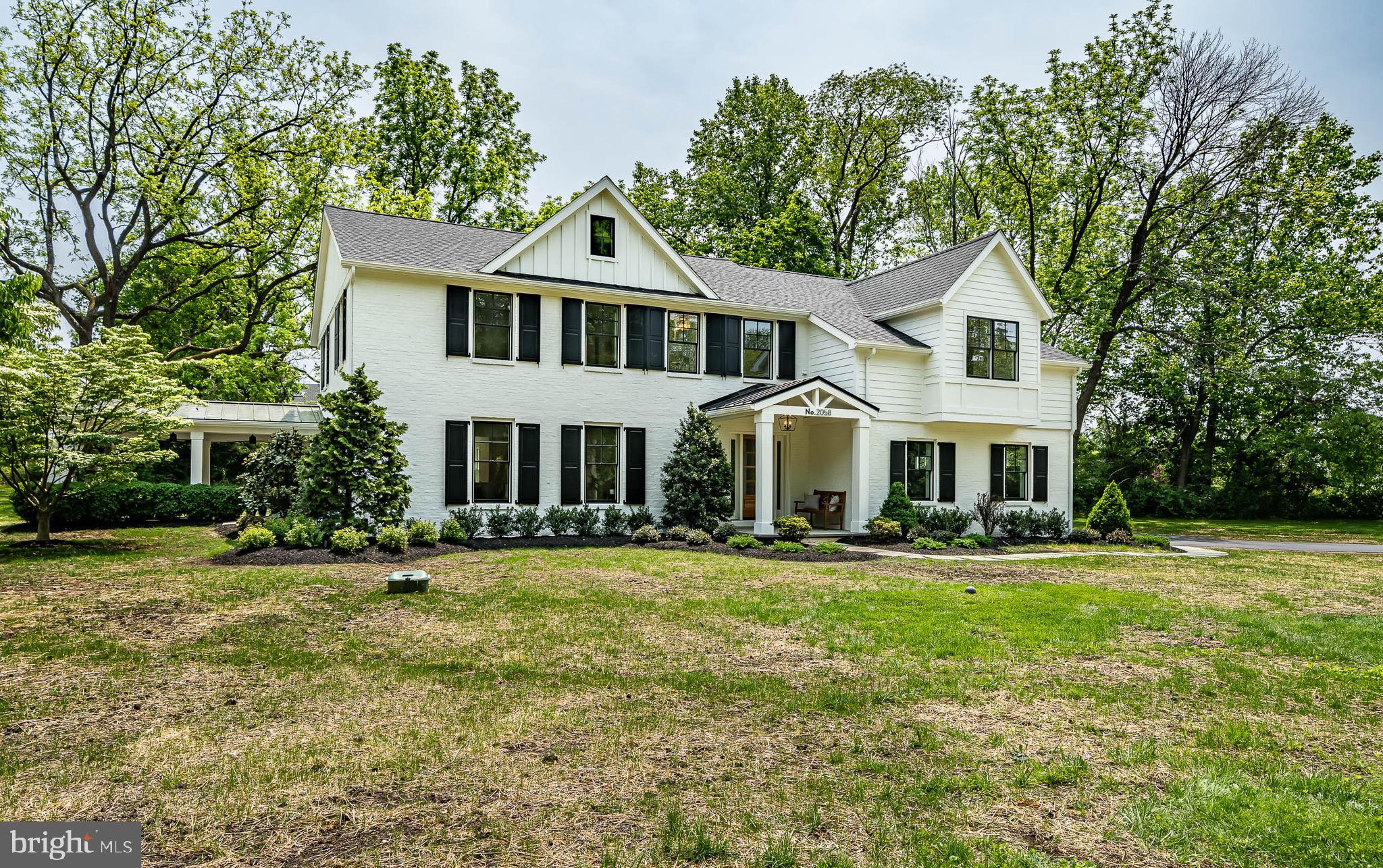 2058 Waterloo Road Berwyn, PA 19312 - Photo 1 of 46 a front view of a house with a yard
