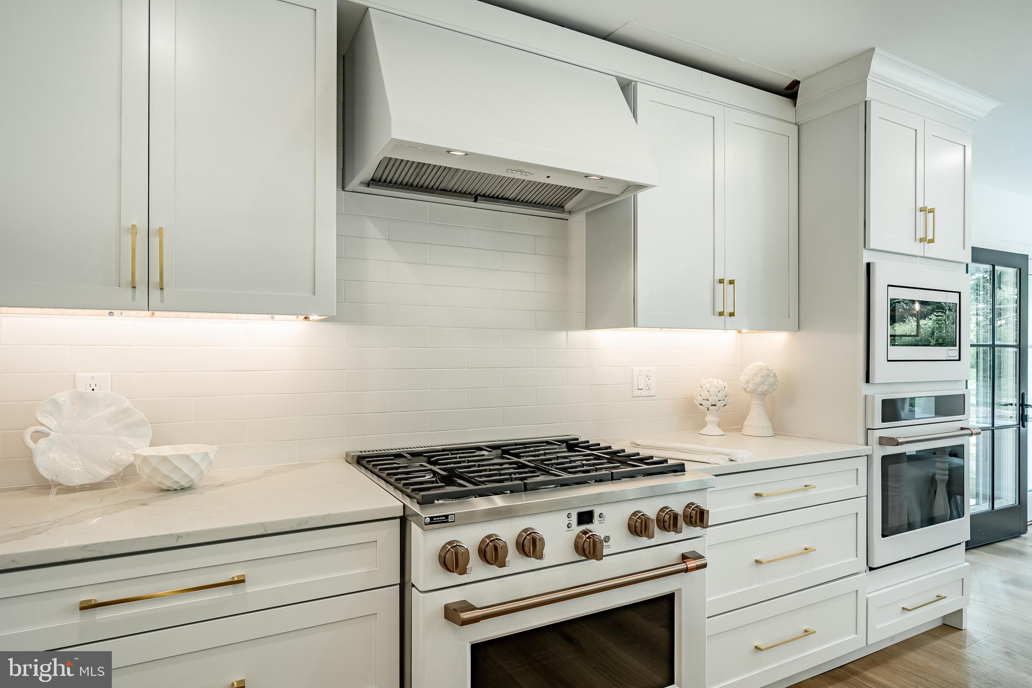 2058 Waterloo Road Berwyn, PA 19312 - Photo 13 of 46 a stove top oven sitting inside of a kitchen