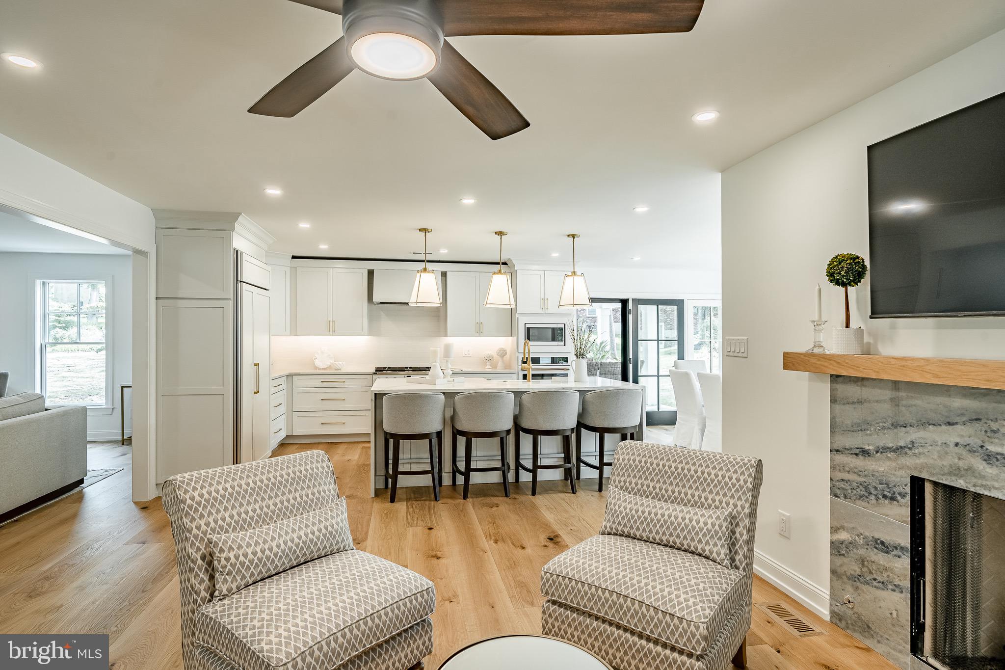 2058 Waterloo Road Berwyn, PA 19312 - Photo 20 of 46 a living room with furniture kitchen view and a chandelier