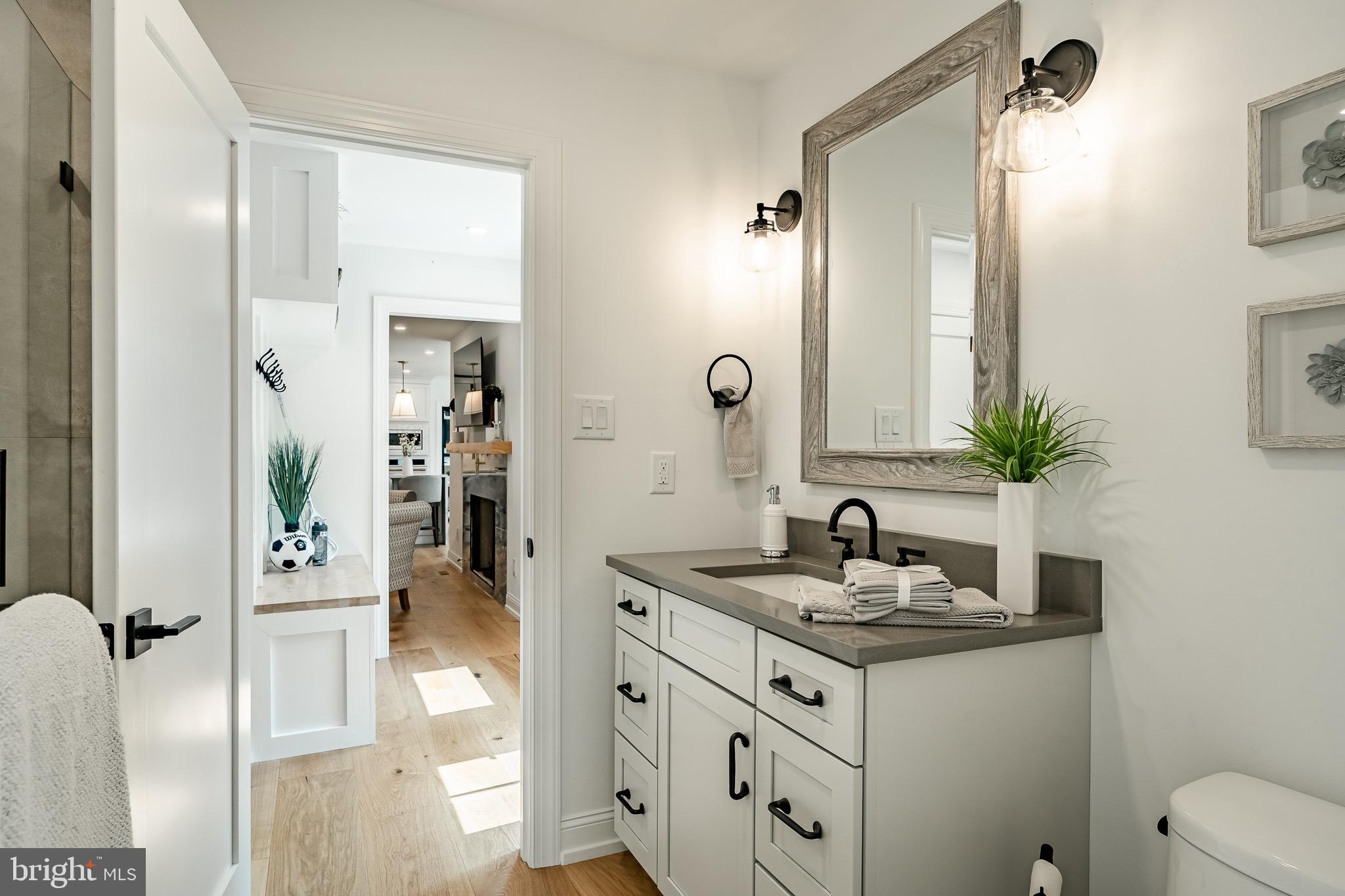 2058 Waterloo Road Berwyn, PA 19312 - Photo 23 of 46 a bathroom with a sink and a mirror
