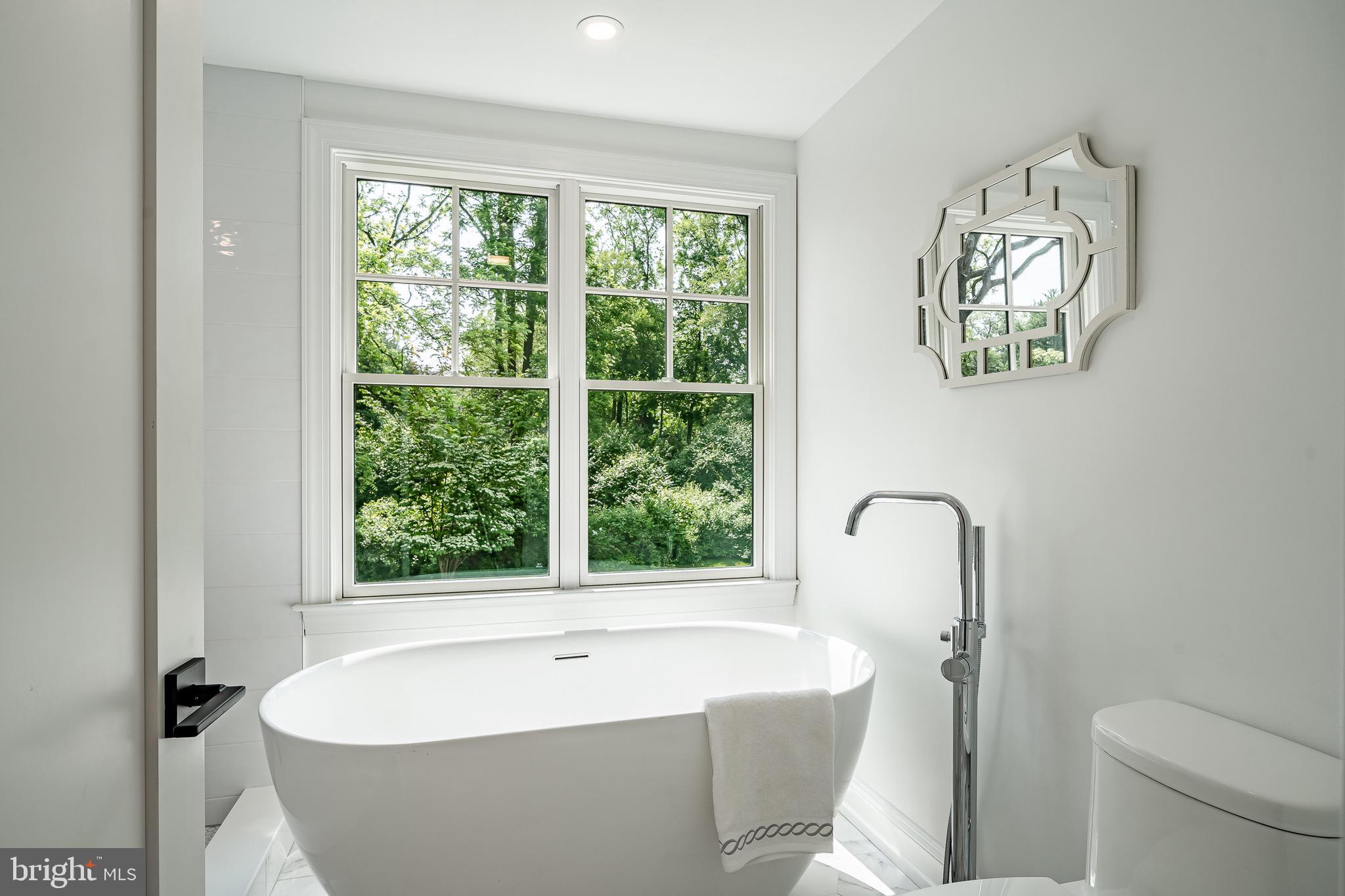2058 Waterloo Road Berwyn, PA 19312 - Photo 27 of 46 a white bath tub sitting next to a window