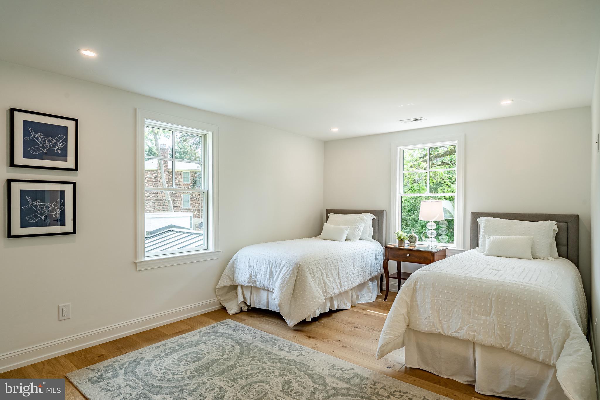 2058 Waterloo Road Berwyn, PA 19312 - Photo 28 of 46 a bedroom with two beds and a window
