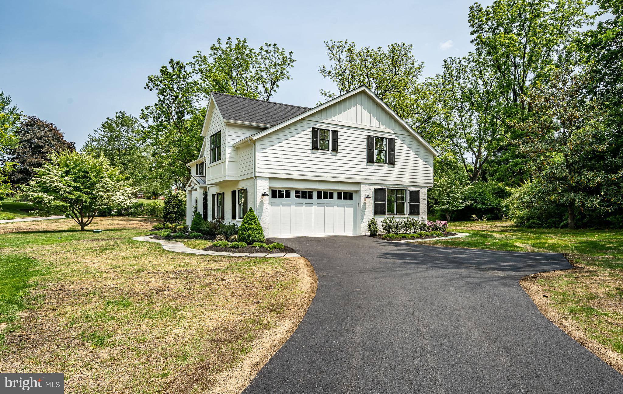 2058 Waterloo Road Berwyn, PA 19312 - Photo 3 of 46 a front view of house with yard and green space