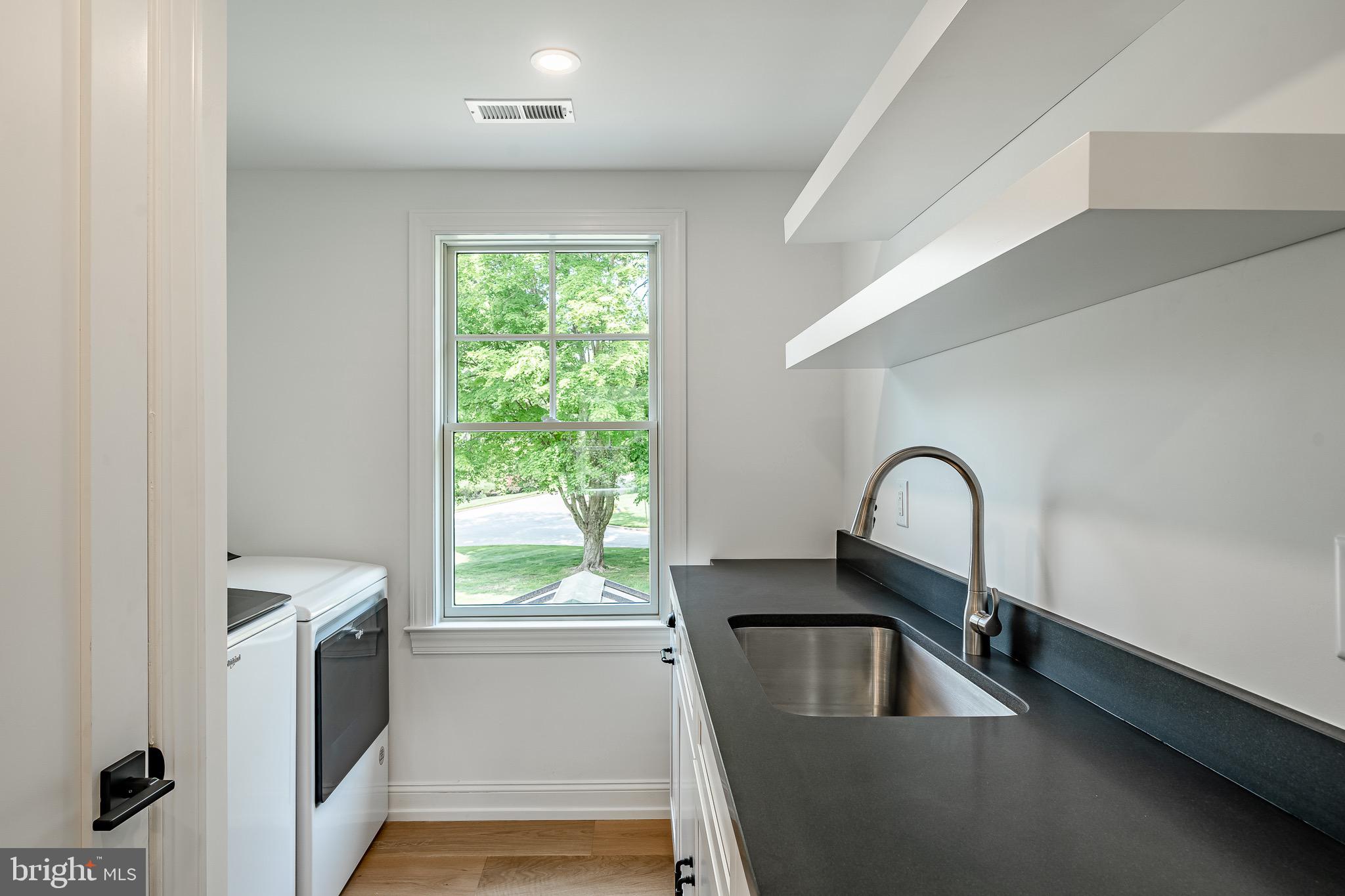 2058 Waterloo Road Berwyn, PA 19312 - Photo 36 of 46 a view of living room with a fireplace and windows