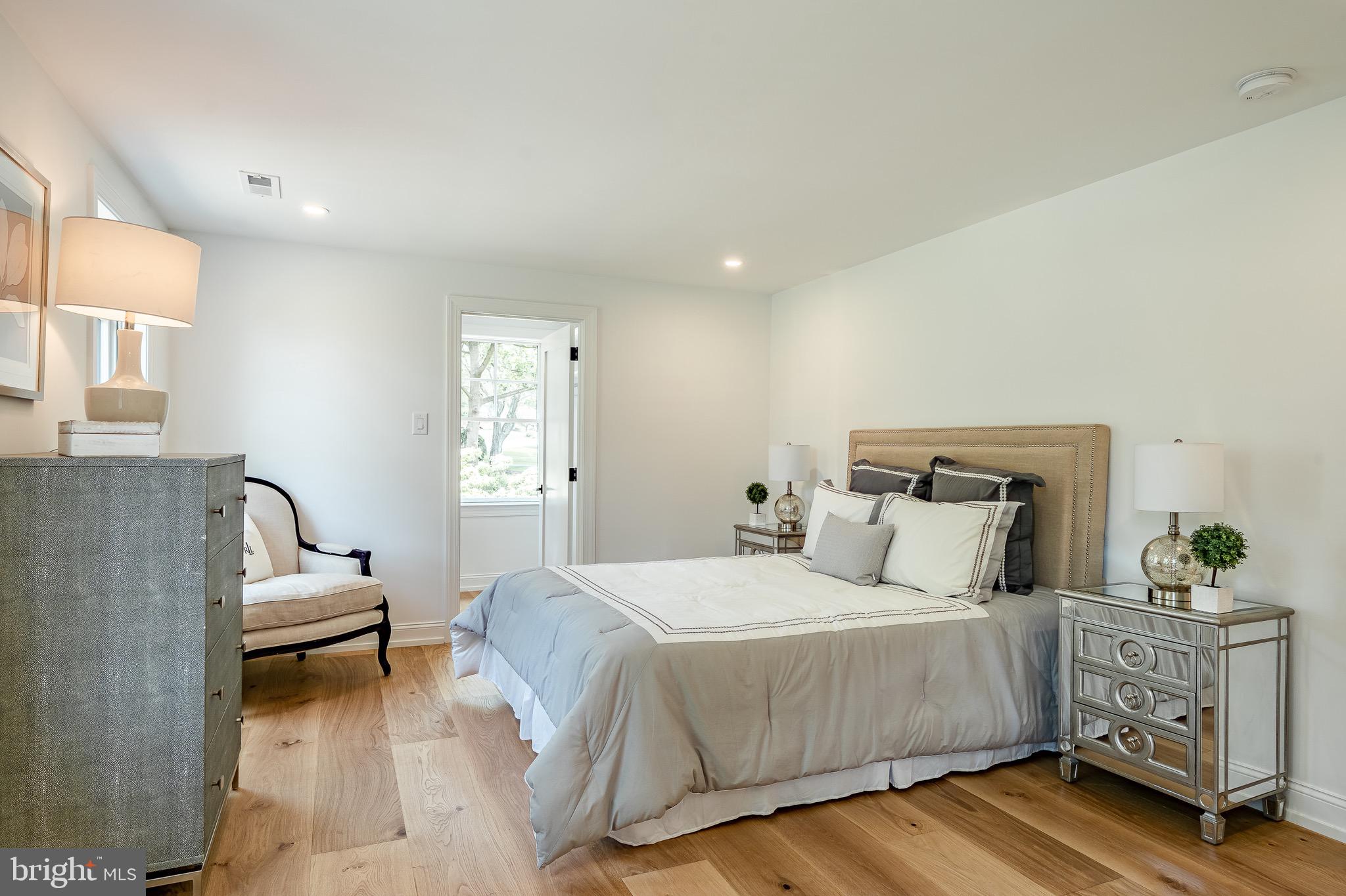 2058 Waterloo Road Berwyn, PA 19312 - Photo 38 of 46 a bedroom with a bed and a couch