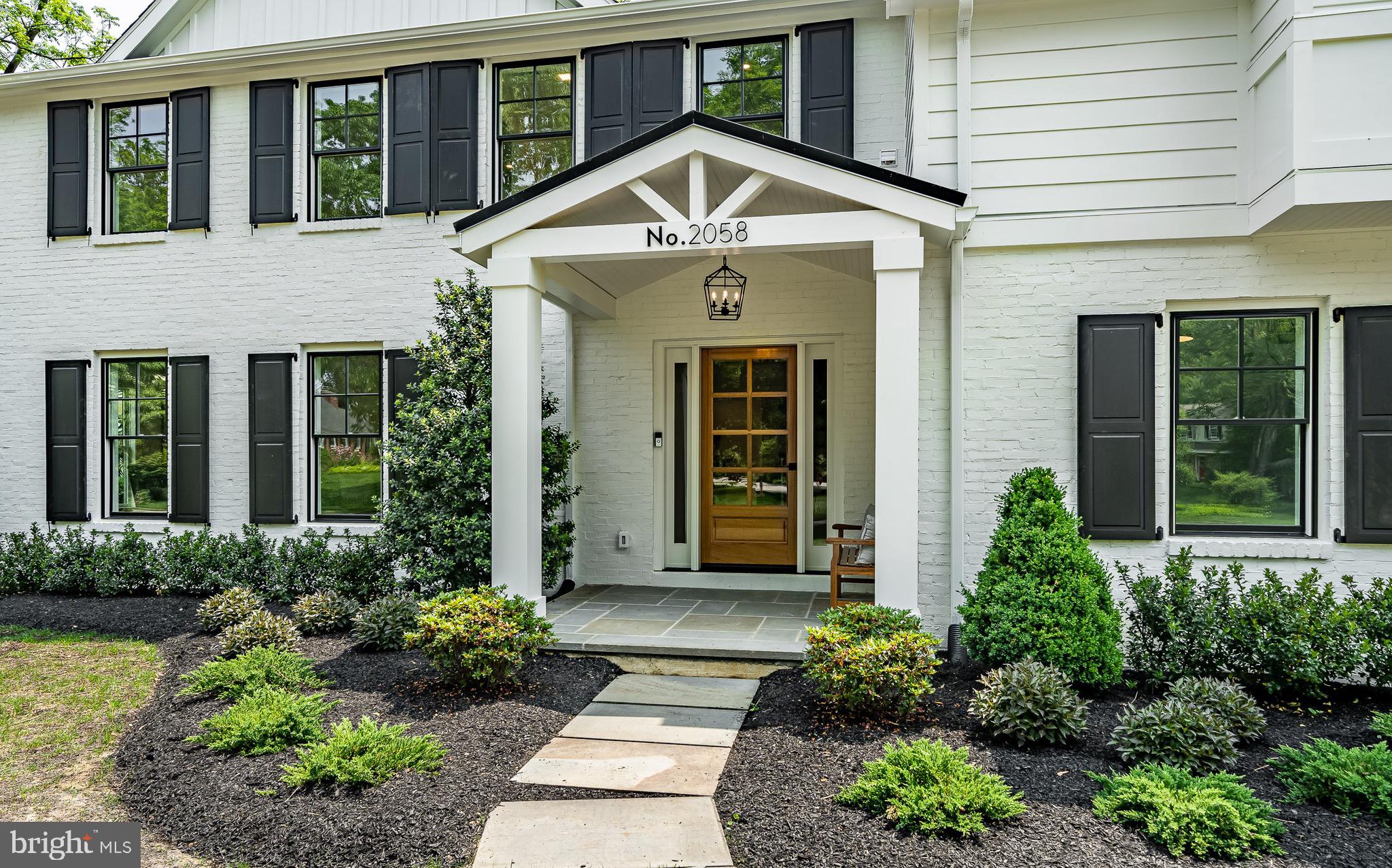2058 Waterloo Road Berwyn, PA 19312 - Photo 4 of 46 a front view of a house with garden