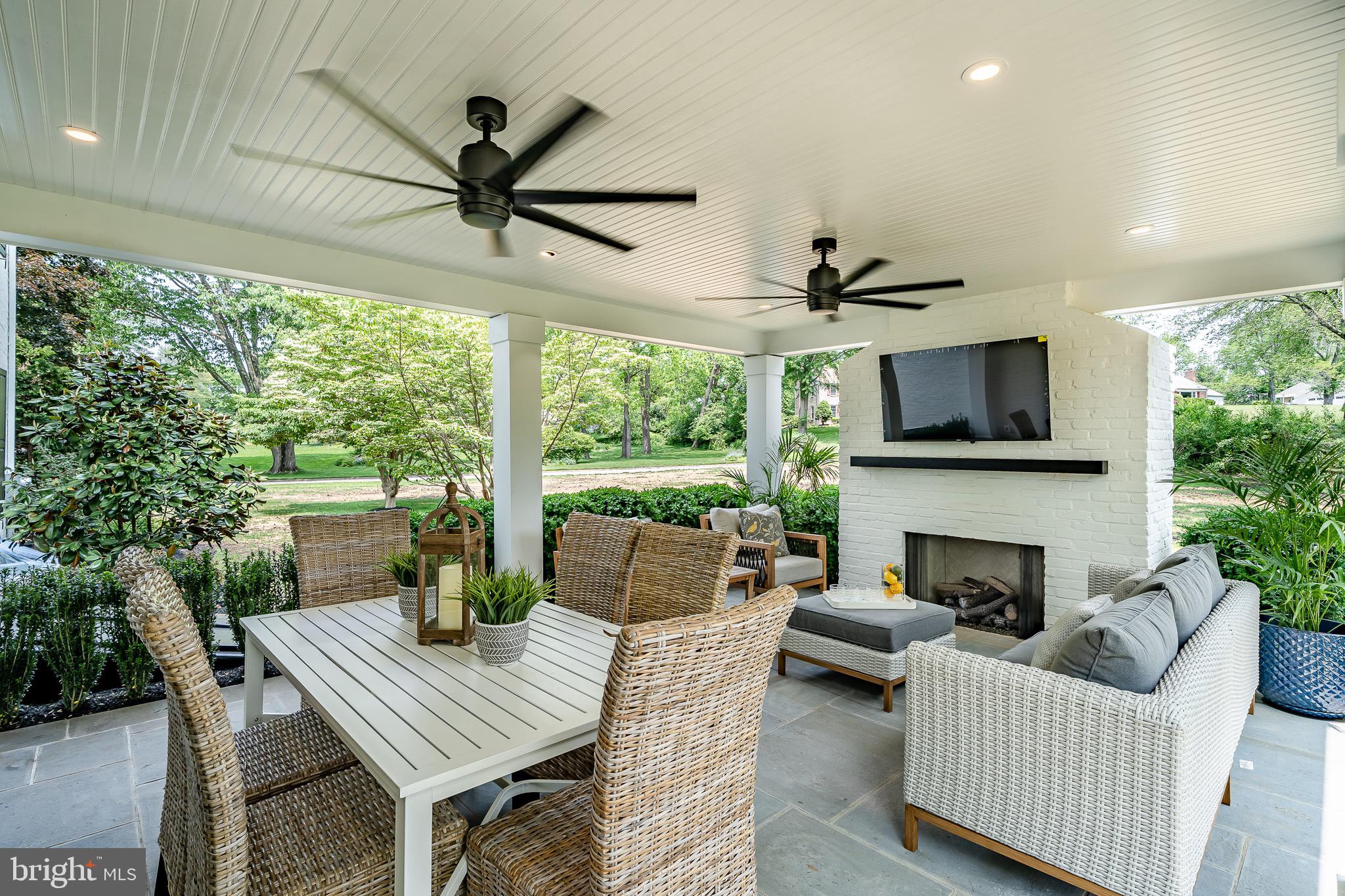 2058 Waterloo Road Berwyn, PA 19312 - Photo 41 of 46 a outdoor space with patio fireplace furniture and a potted plant