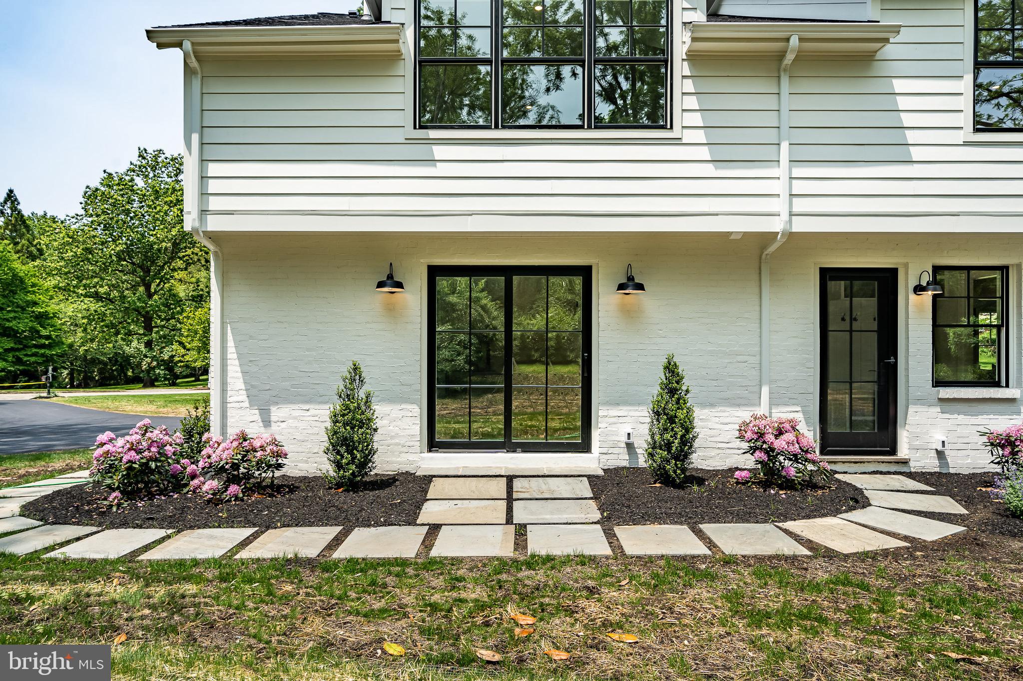 2058 Waterloo Road Berwyn, PA 19312 - Photo 46 of 46 a front view of a house with a yard